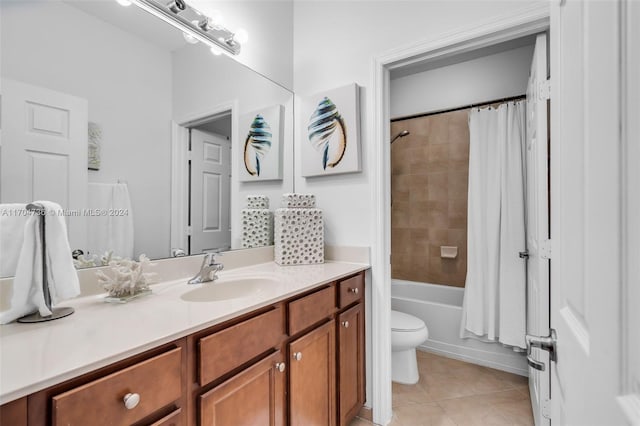 full bathroom featuring tile patterned floors, vanity, shower / tub combo, and toilet