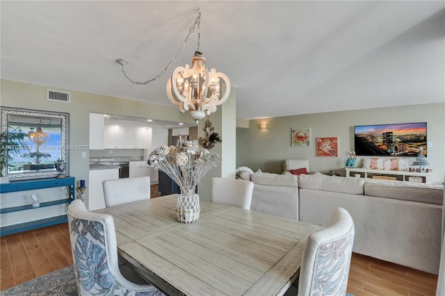 dining room featuring a notable chandelier