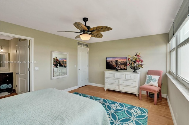 bedroom featuring ceiling fan and light hardwood / wood-style flooring