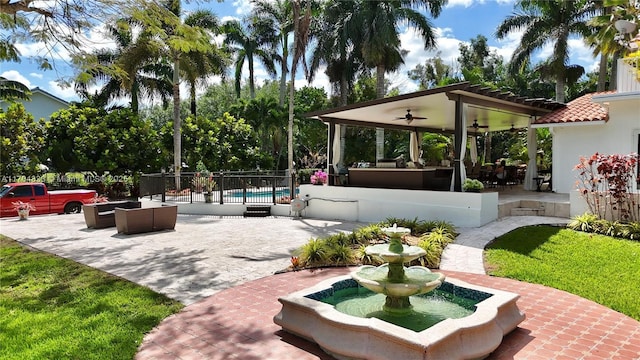 view of patio / terrace featuring ceiling fan and outdoor lounge area