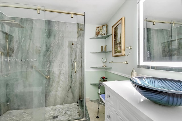 bathroom featuring vanity and walk in shower