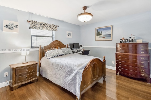 bedroom featuring hardwood / wood-style flooring