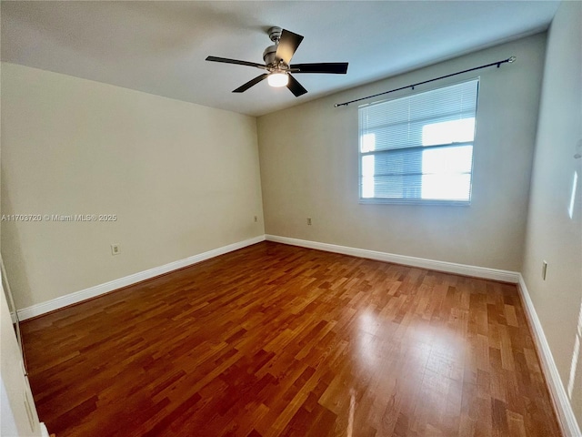 unfurnished room featuring hardwood / wood-style flooring and ceiling fan