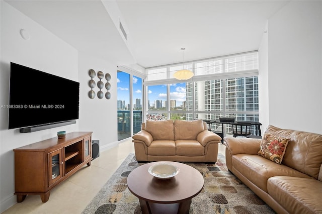 living room with floor to ceiling windows