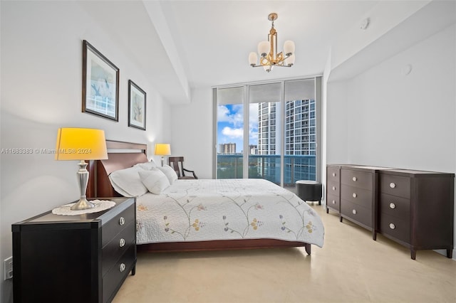 bedroom featuring a notable chandelier