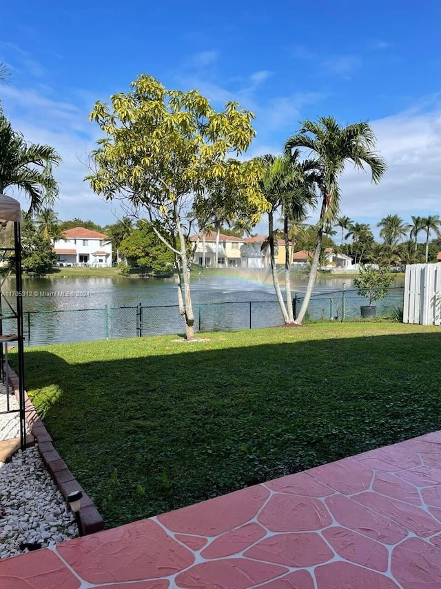 view of yard with a water view