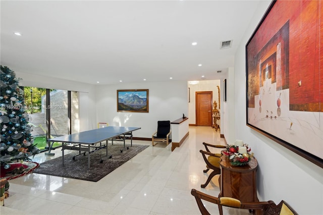 playroom featuring light tile patterned floors