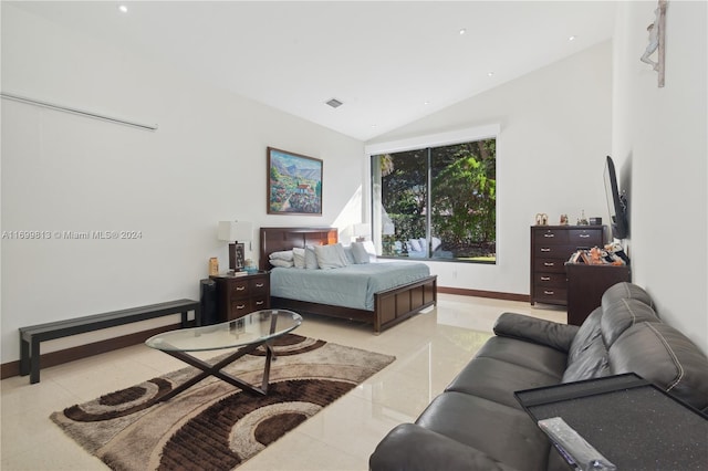 bedroom featuring lofted ceiling