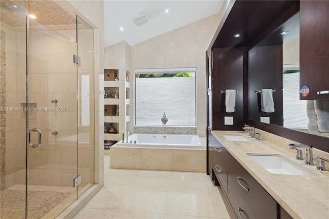 bathroom featuring separate shower and tub, tile patterned flooring, and vanity