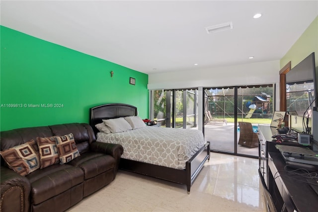 7001 Robles St, Coral Gables, FL 33143 - bedroom with access to exterior, recessed lighting, and an accent wall
