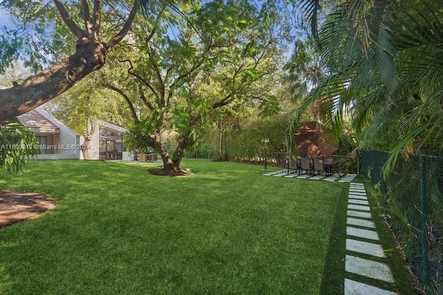 7001 Robles St, Coral Gables, FL 33143 - view of yard featuring a patio area