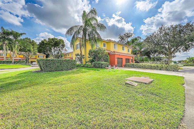 2011 SW 103rd Ter, Miramar, FL 33025 - view of front of house with a garage, stucco siding, concrete driveway, and a front yard