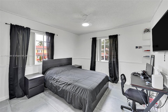 2011 SW 103rd Ter, Miramar, FL 33025 - bedroom with multiple windows, a textured ceiling, and ceiling fan