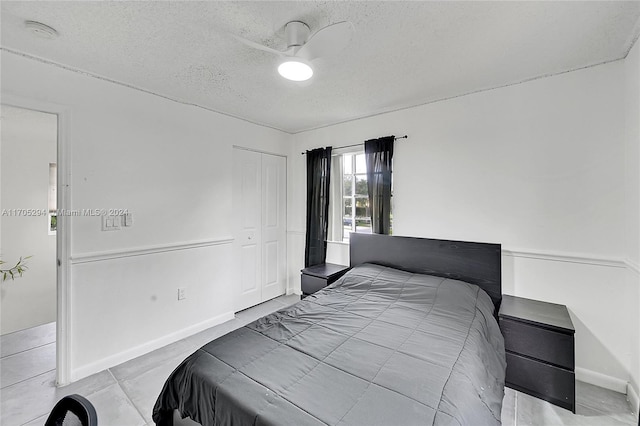 2011 SW 103rd Ter, Miramar, FL 33025 - bedroom with a textured ceiling and a closet