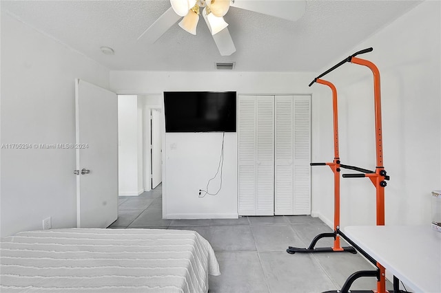 2011 SW 103rd Ter, Miramar, FL 33025 - bedroom featuring ceiling fan, a textured ceiling, and a closet