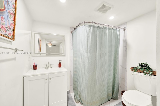 bathroom with a shower with shower curtain, ceiling fan, toilet, and vanity