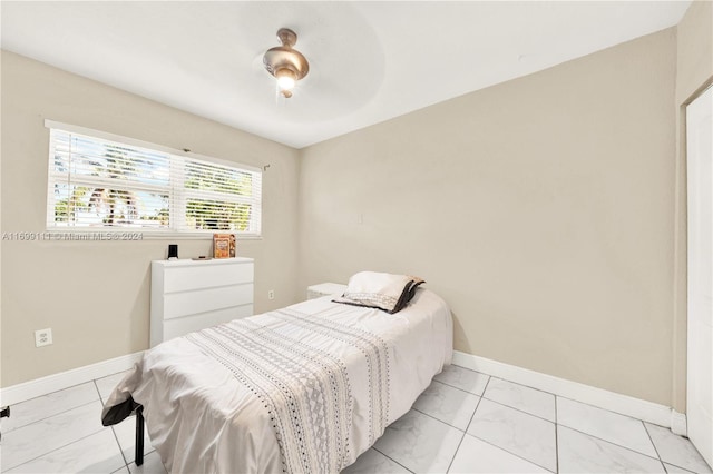 bedroom featuring ceiling fan
