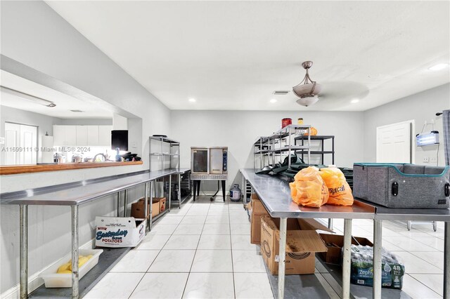 kitchen featuring ceiling fan