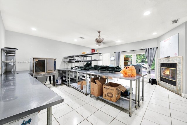 kitchen with a stone fireplace