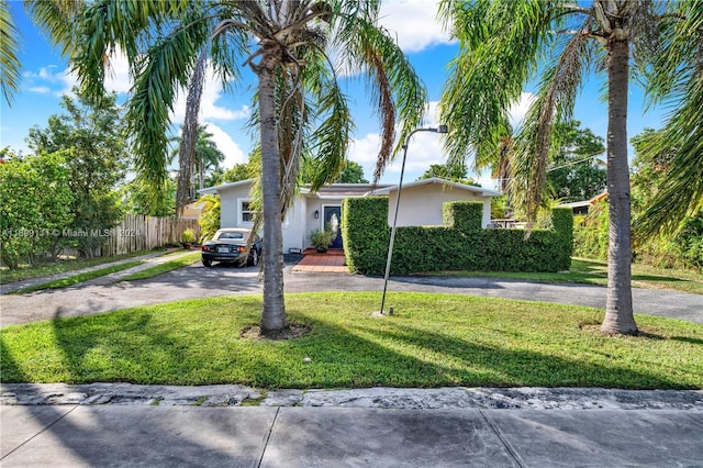 view of front of property with a front lawn