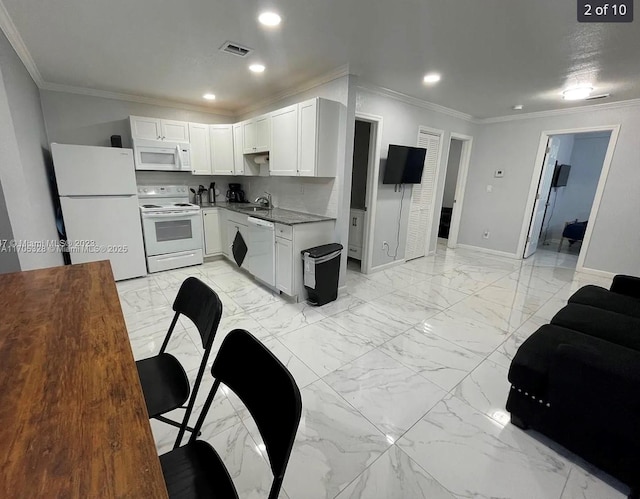 kitchen with sink, white appliances, white cabinetry, tasteful backsplash, and ornamental molding