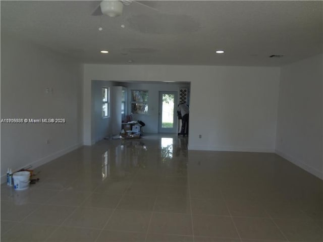 empty room featuring tile patterned flooring