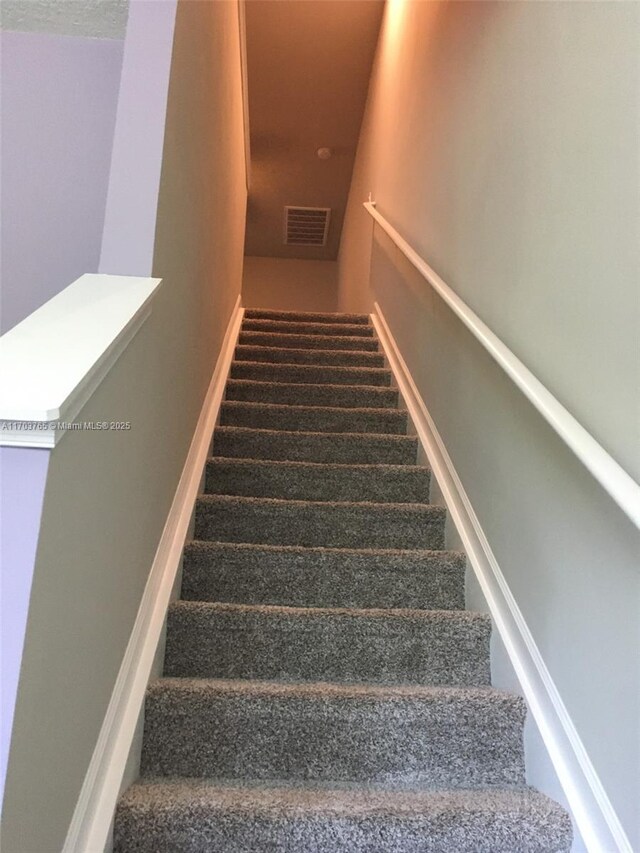 office area featuring carpet and ceiling fan