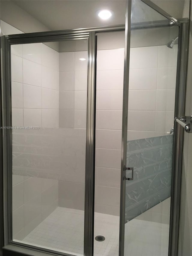 bathroom featuring a stall shower