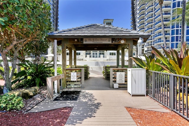 wooden terrace with a gazebo