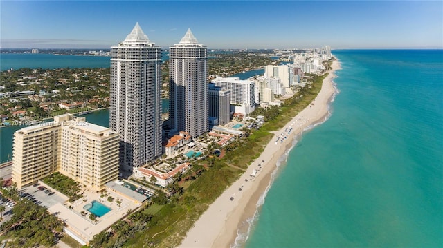 aerial view featuring a beach view and a water view