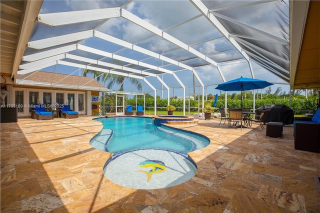 view of swimming pool with area for grilling, glass enclosure, outdoor lounge area, an in ground hot tub, and a patio