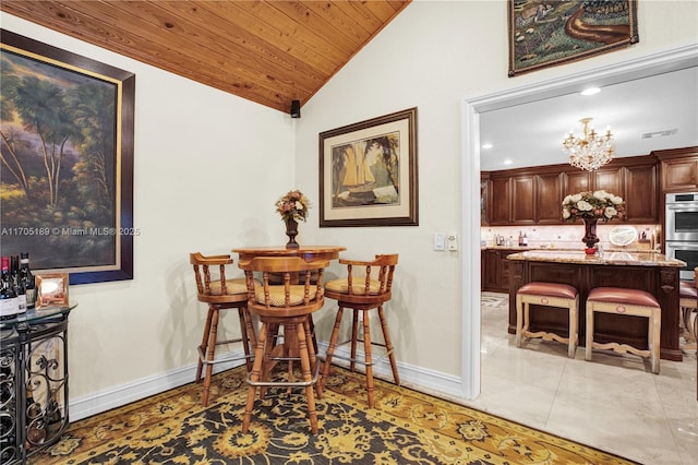 7720 SW 183rd Ter, Palmetto Bay, FL 33157 - dining area featuring wood ceiling, vaulted ceiling, and a notable chandelier