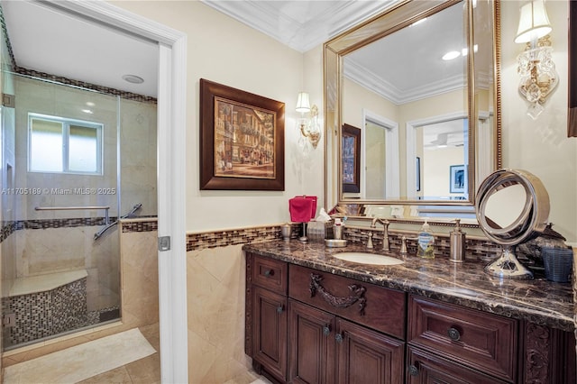 7720 SW 183rd Ter, Palmetto Bay, FL 33157 - bathroom featuring ornamental molding, a shower with shower door, tile walls, and vanity