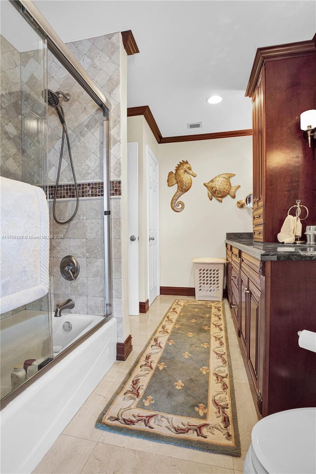 7720 SW 183rd Ter, Palmetto Bay, FL 33157 - full bathroom with combined bath / shower with glass door, tile patterned flooring, vanity, ornamental molding, and toilet