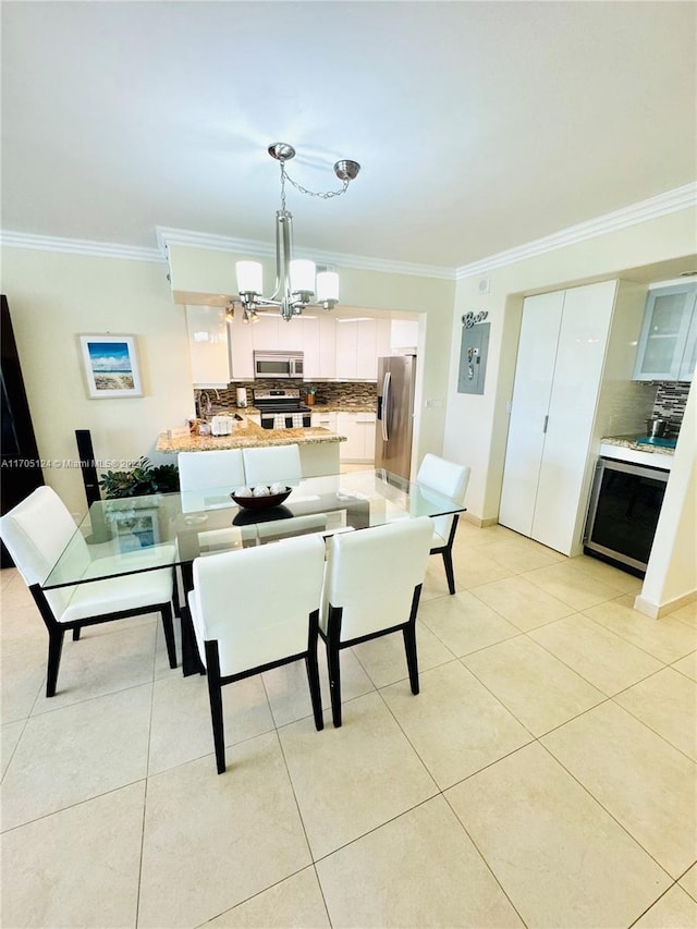 tiled dining area with ornamental molding and a notable chandelier