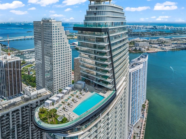 aerial view featuring a view of city and a water view