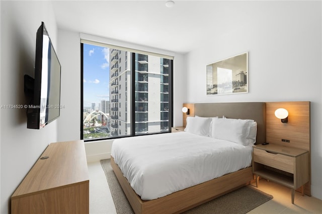 bedroom featuring multiple windows