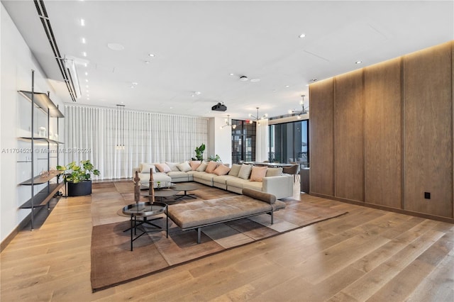 living room with light hardwood / wood-style flooring