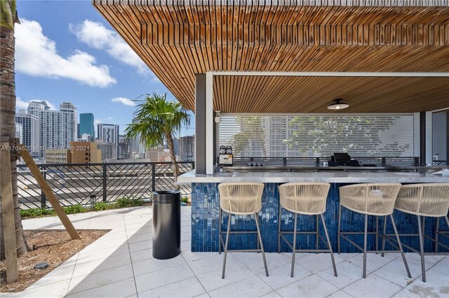 view of patio featuring a bar