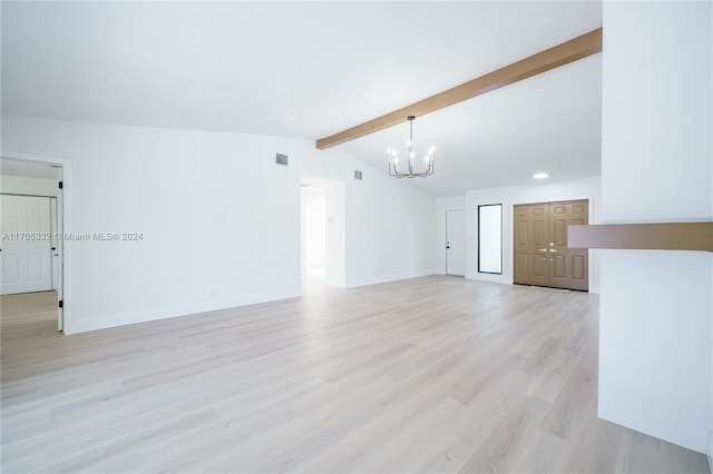 unfurnished living room with light hardwood / wood-style flooring, lofted ceiling with beams, and a notable chandelier