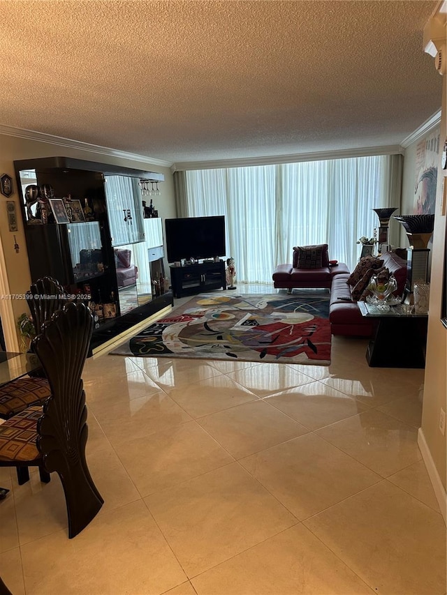 tiled living room with a textured ceiling and ornamental molding