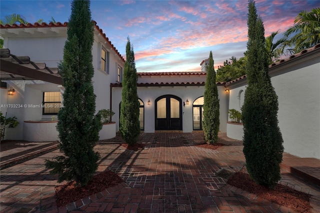 exterior space featuring a patio area and french doors