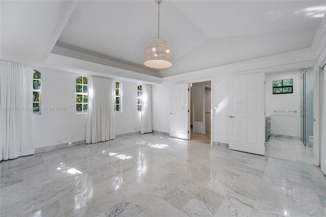 spare room featuring vaulted ceiling