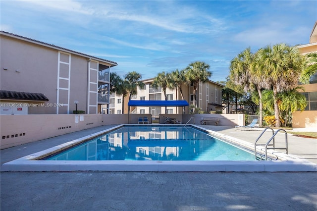 view of pool featuring a patio area