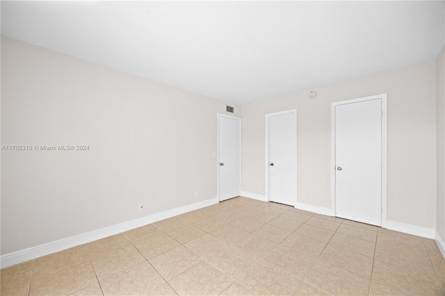 10001 W Atlantic Blvd Unit 316, Coral Springs, FL 33071 - unfurnished bedroom with baseboards