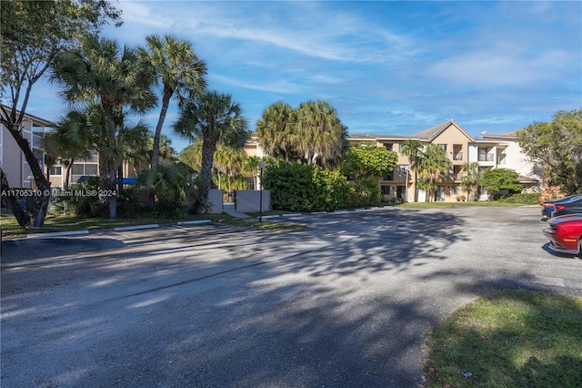 10001 W Atlantic Blvd Unit 316, Coral Springs, FL 33071 - view of asphalt road with a residential view