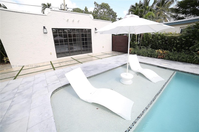 view of pool with a patio