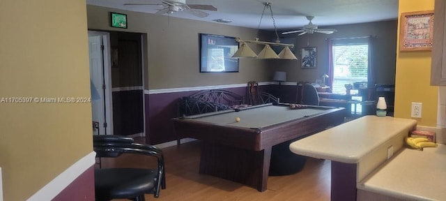 rec room with ceiling fan, pool table, and hardwood / wood-style flooring