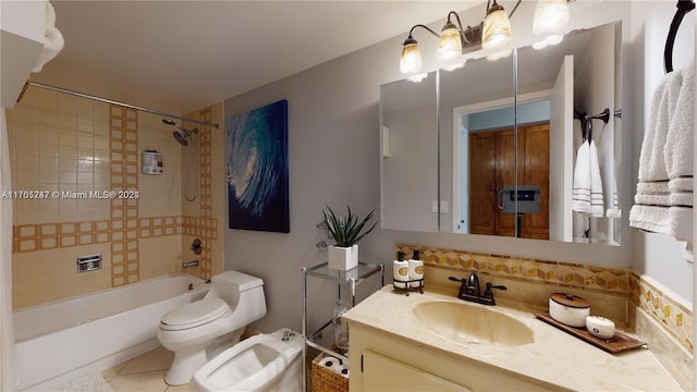 full bathroom featuring tile patterned floors, vanity, tiled shower / bath combo, a bidet, and toilet