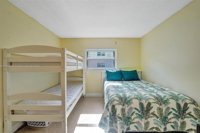 bedroom featuring a textured ceiling